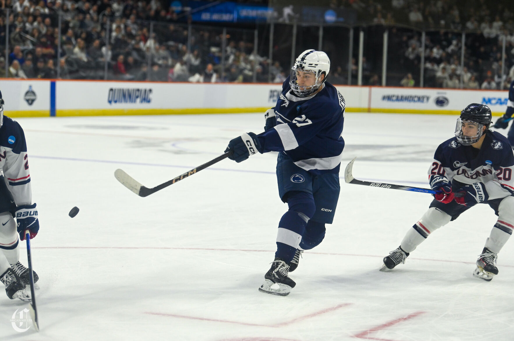 Men's Hockey vs Uconn, Cade Christenson (27) shoots